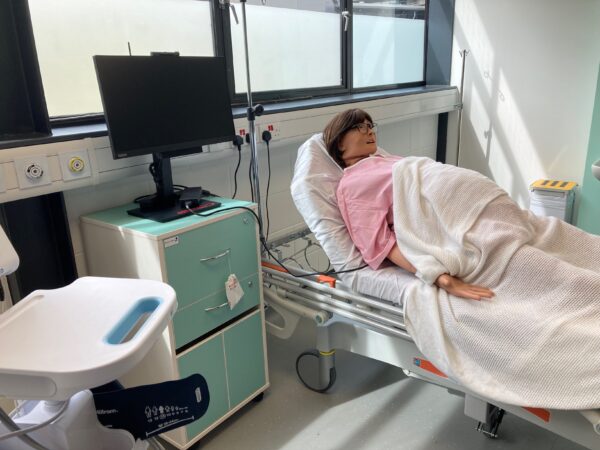 Hospital simulation suite with pregnant dummy.